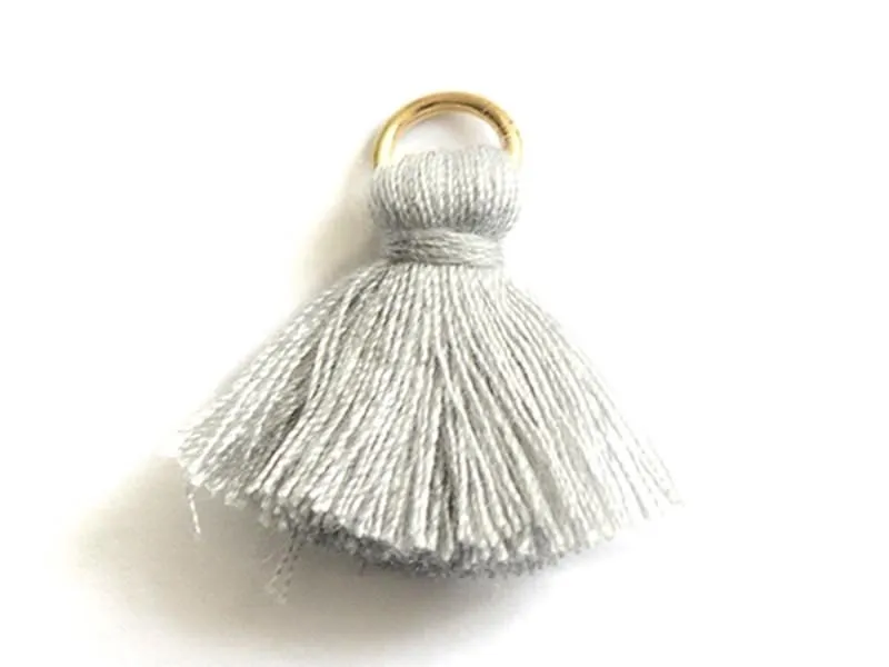 Acheter pendentif pompon - gris en ligne.